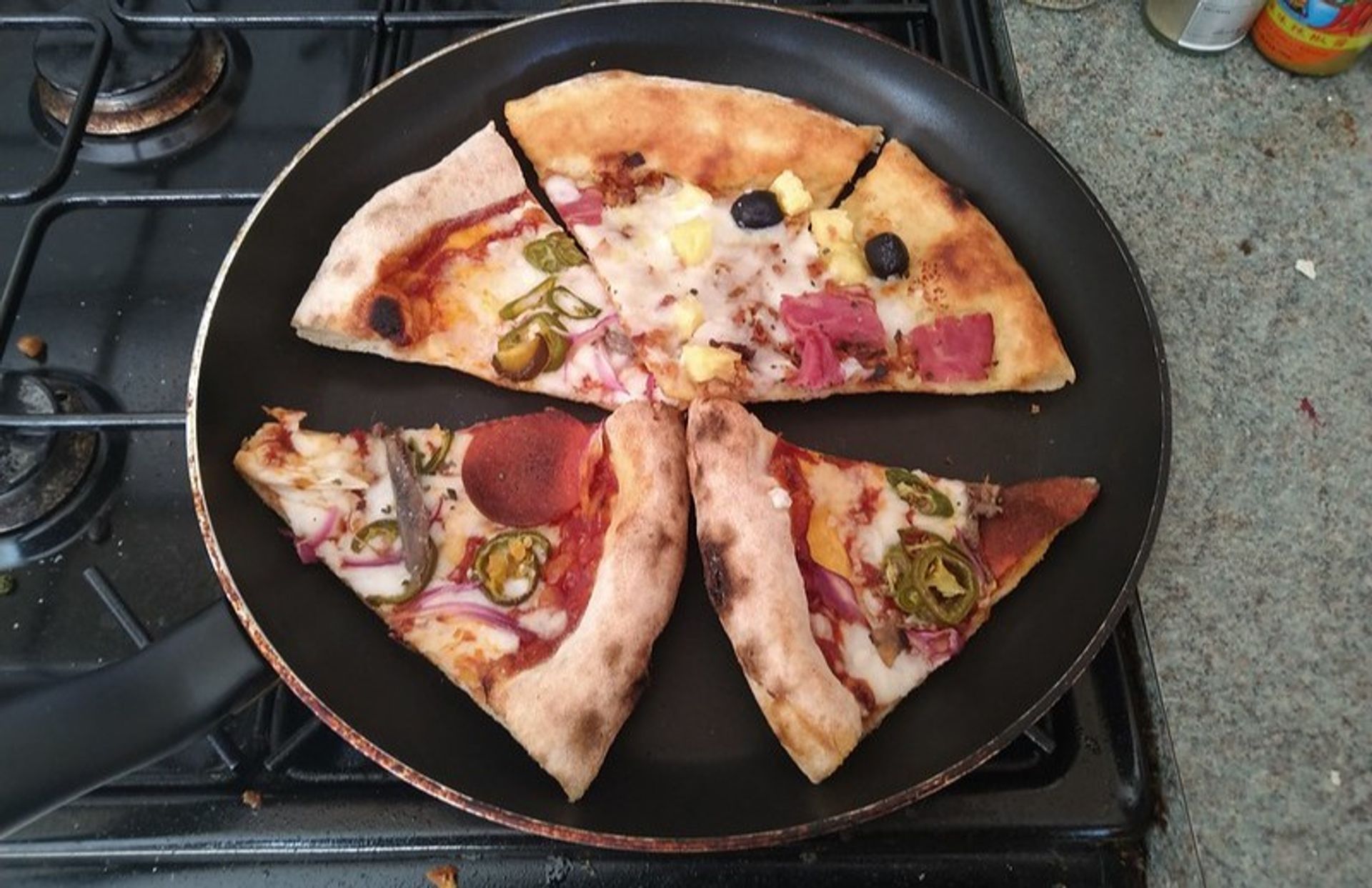 beste manier pizza opwarmen